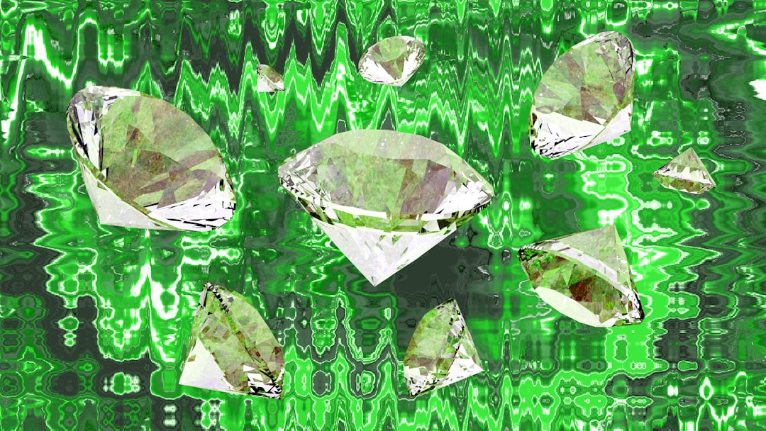 Several diamonds scattered on a green abstract background
