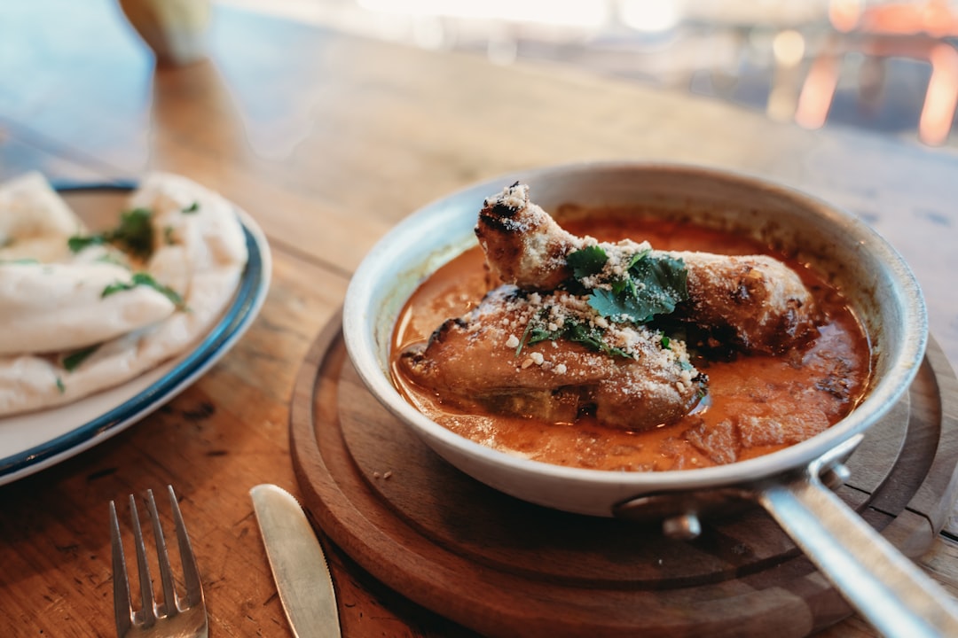 Chicken tikka masala served with naan bread